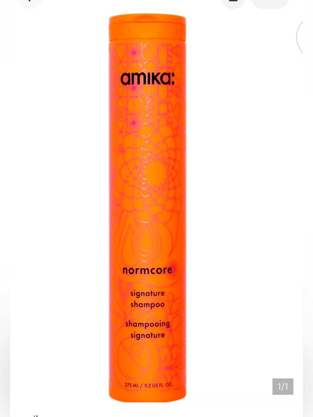 amika Normcore Signature Shampoo — Bright Orange Bottle